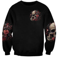 Black unisex sweatshirt with small zombie skull chest print and skull sleeve graphics