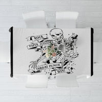 White tablecloth with black Rock Paper Scissors skull and skeleton print, top view