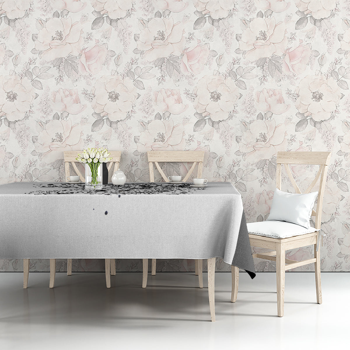 White tablecloth with black skull game print on dining table with neatly draped edge