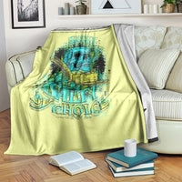 Lime yellow blanket with teal skull graphic and 'Salty Choice' lettering on bed