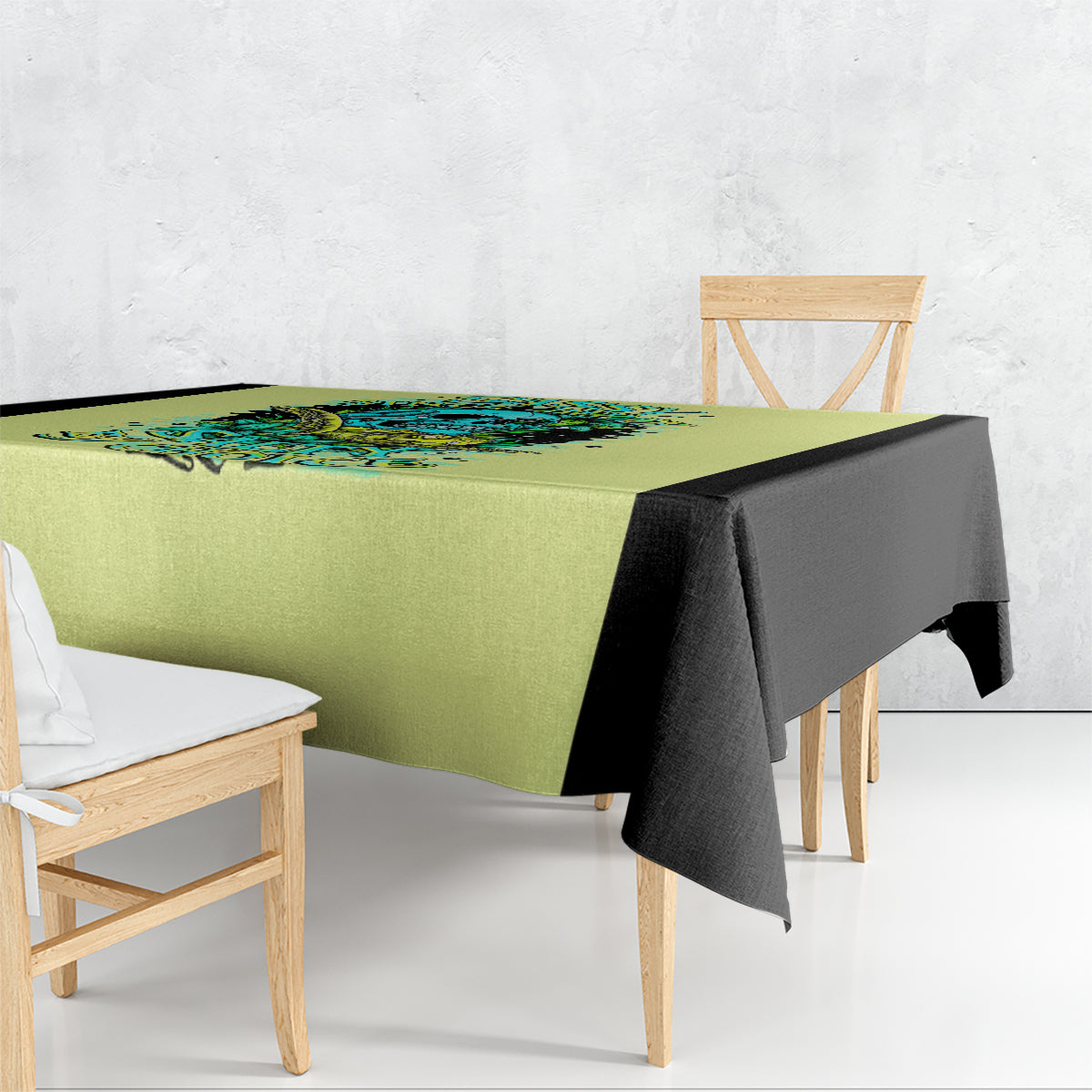 Yellow tablecloth with turtle skull graphic and blue-green details, black corner drape