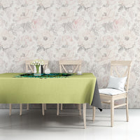 Yellow tablecloth with turtle skull graphic and black corner fold on dining table
