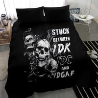 Black bedding set with skull illustration and 'IDK/IDC/IDGAF' style text on duvet