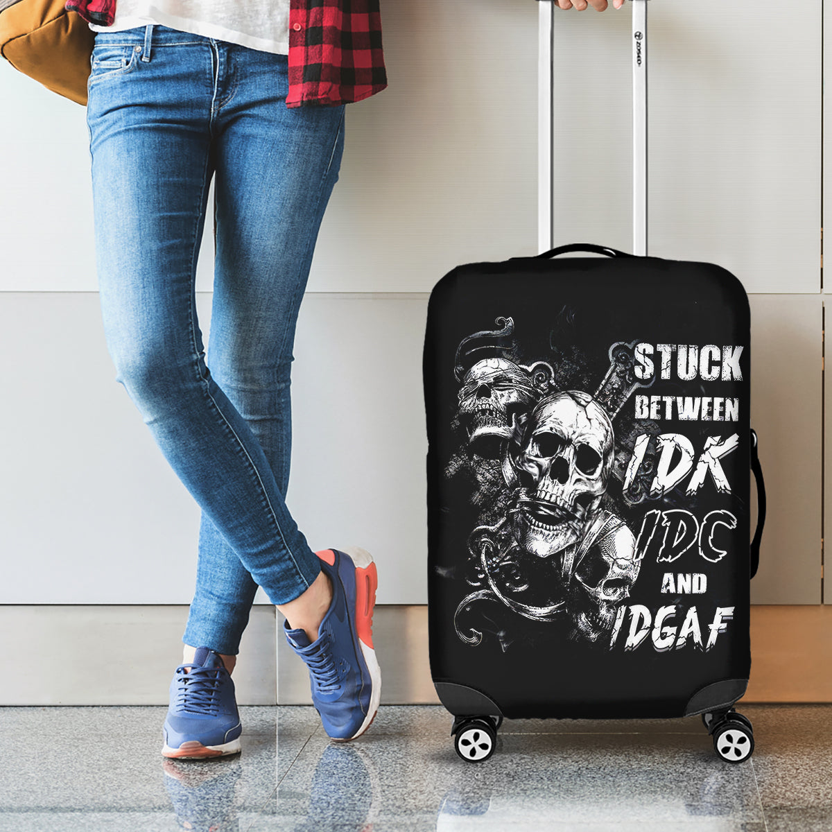 three-skull-luggage-cover-stuck-between-idk-idc-and-idgaf