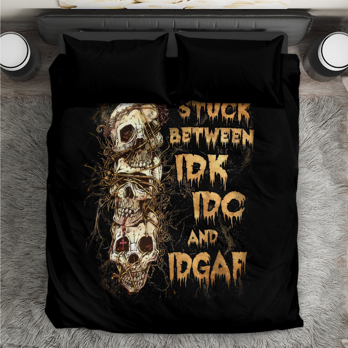 Black skull graphic bedding set with two pillows, top-down view