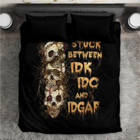 Black skull graphic bedding set with two pillows, top-down view