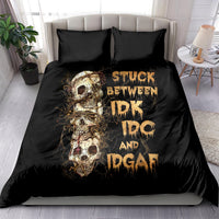 Black skull graphic bedding set with two matching pillows on a bed, front view