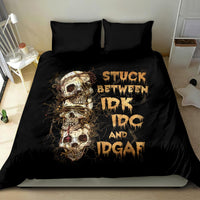 Black skull graphic bedding set with two pillows and duvet, straight-on view