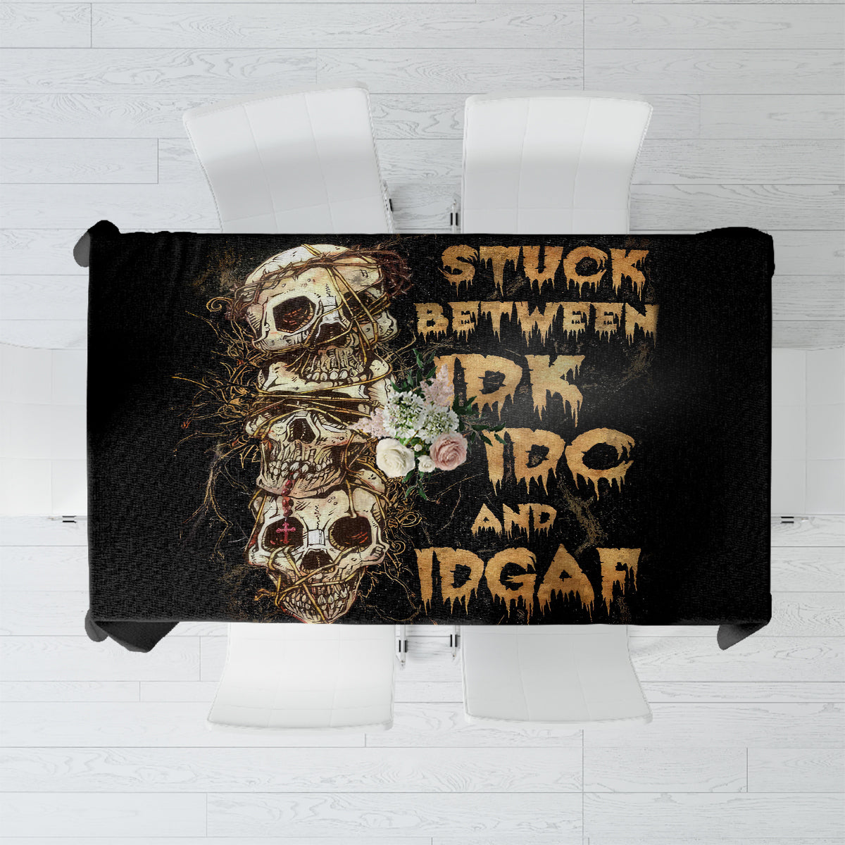 Black skull and text graphic tablecloth laid flat