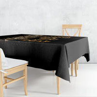 Black skull graphic tablecloth draped over square table