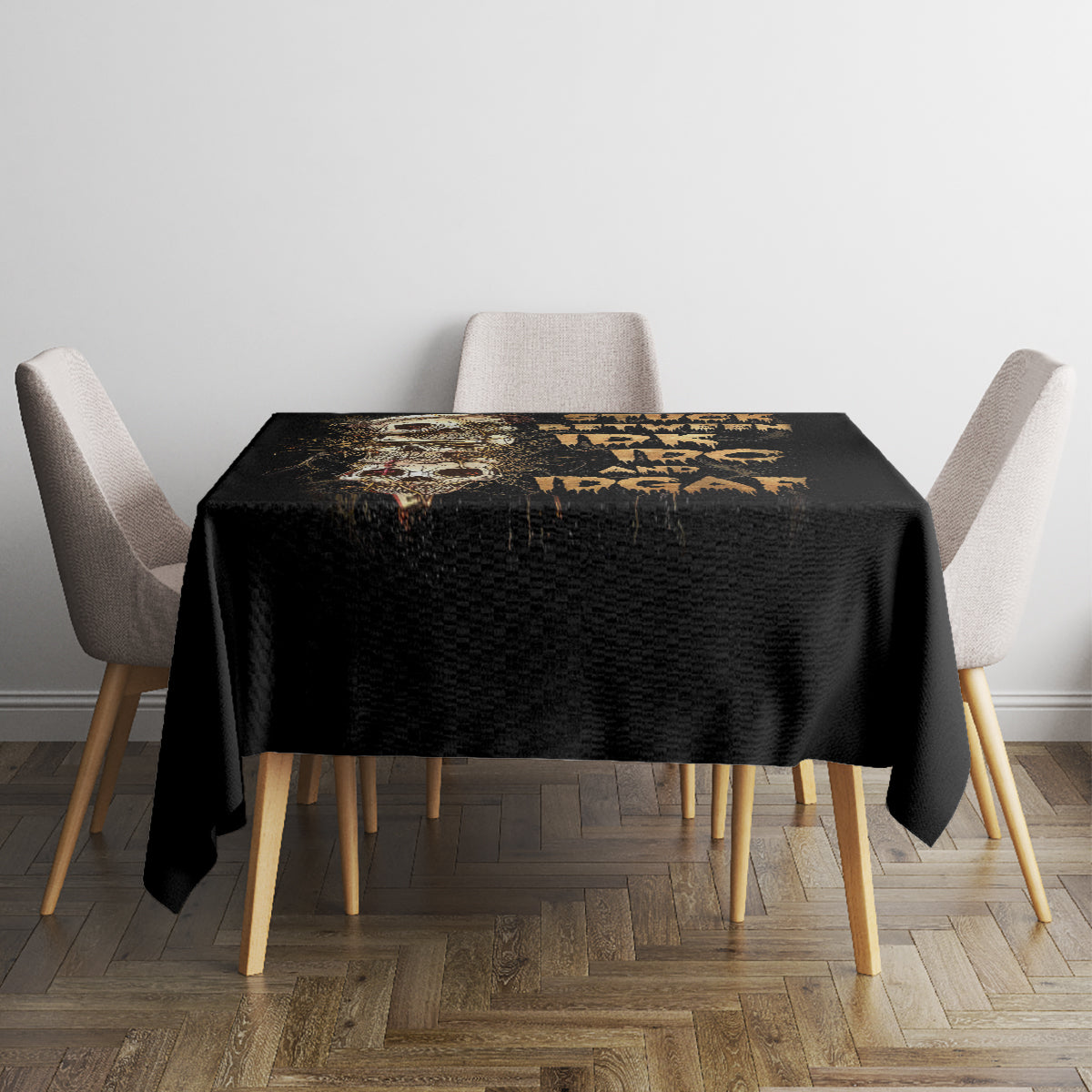 Black skull graphic tablecloth on square dining table with four chairs