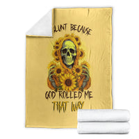 Yellow skull and sunflowers throw blanket, folded display with white towels