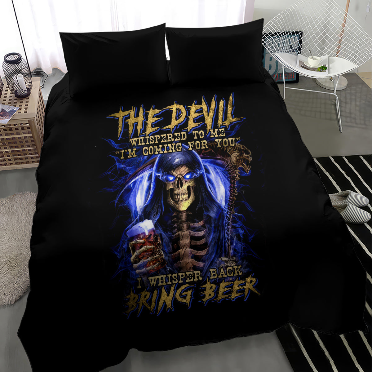 Black bedding set with large blue skull reaper artwork on duvet and two dark pillows