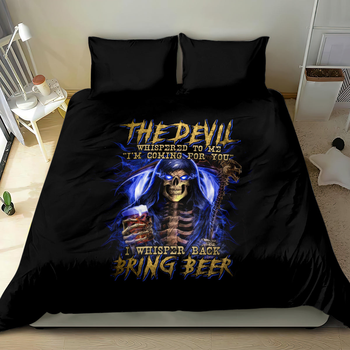 Black bedding set with blue skull reaper graphic on duvet and two dark pillowcases