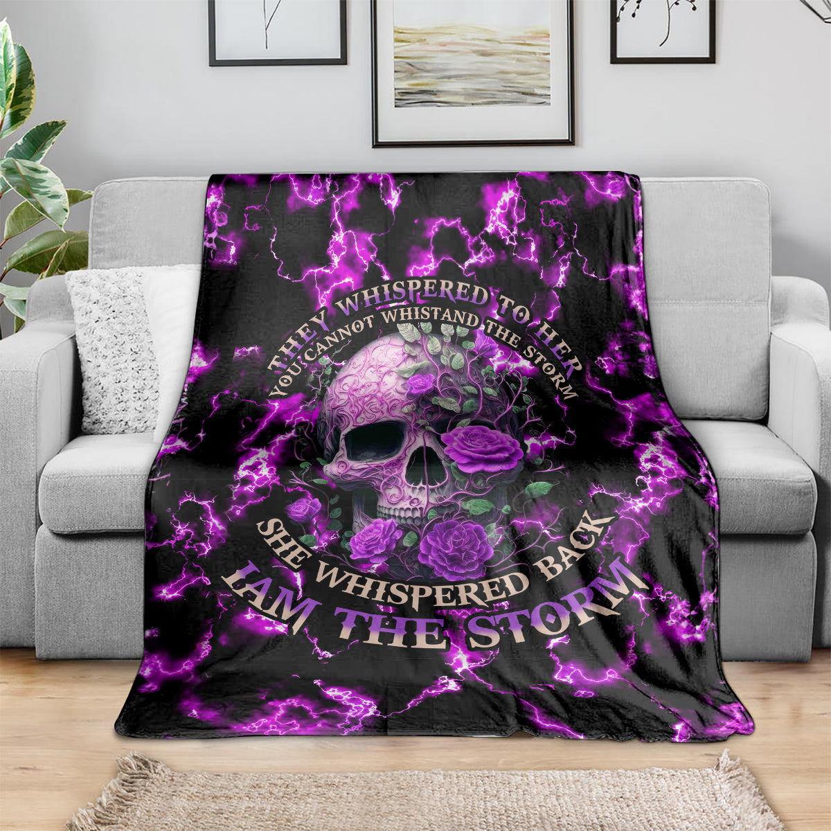 Purple skull and rose blanket with glowing lightning accents, on living room sofa
