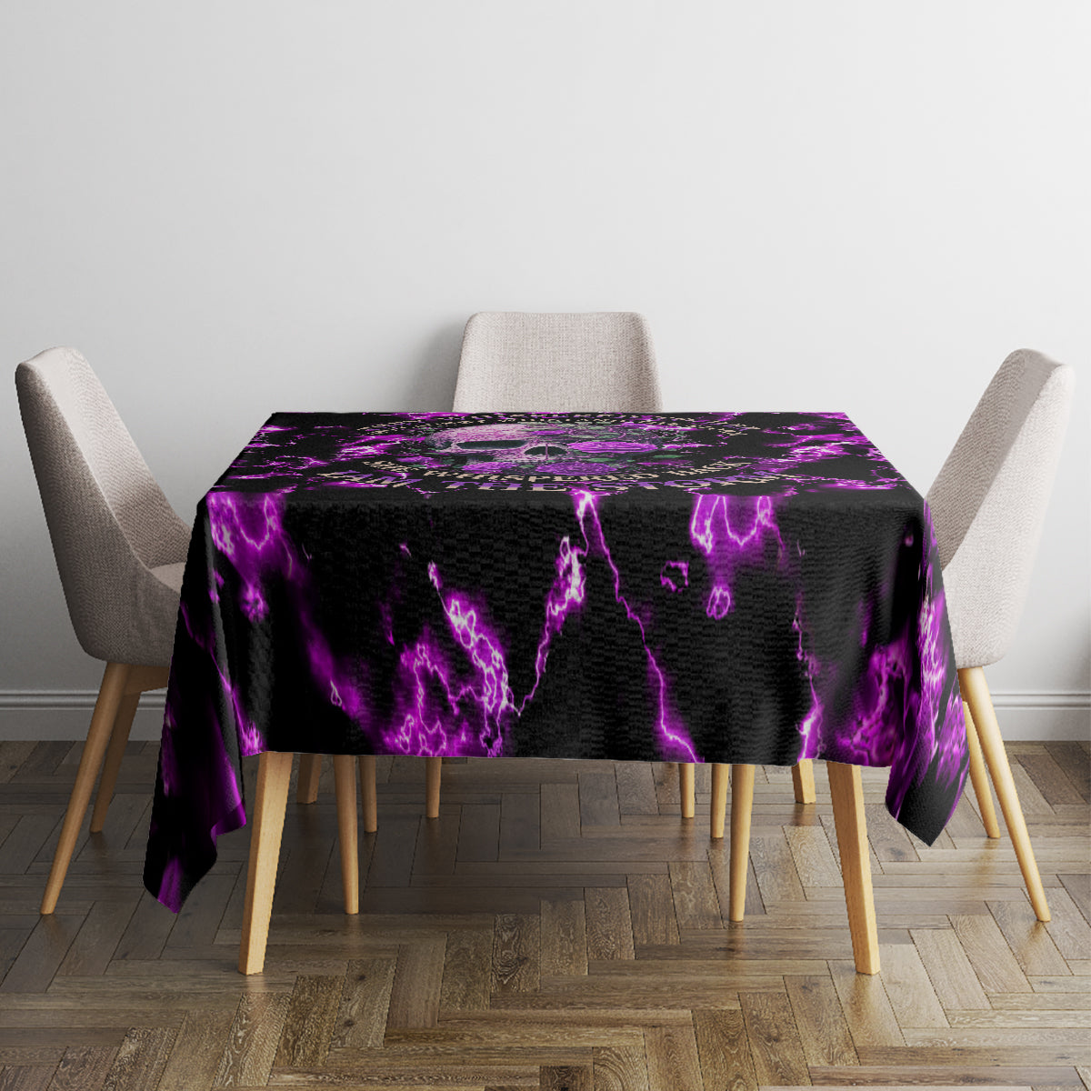 Purple skull-themed tablecloth with lightning pattern centered on dining table