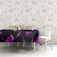 Purple and black lightning tablecloth with skull design on dining table