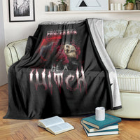 Black witch skull blanket on a bed, showing skeleton face, roses, and flames text