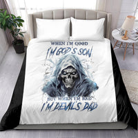 White bedding set with blue hooded skull graphic and bold text on duvet, two pillows