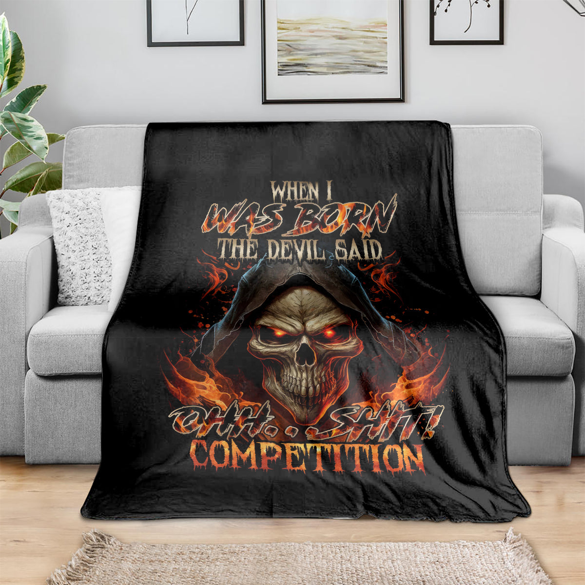 Black flame skull graphic blanket with fiery text and hooded skull design