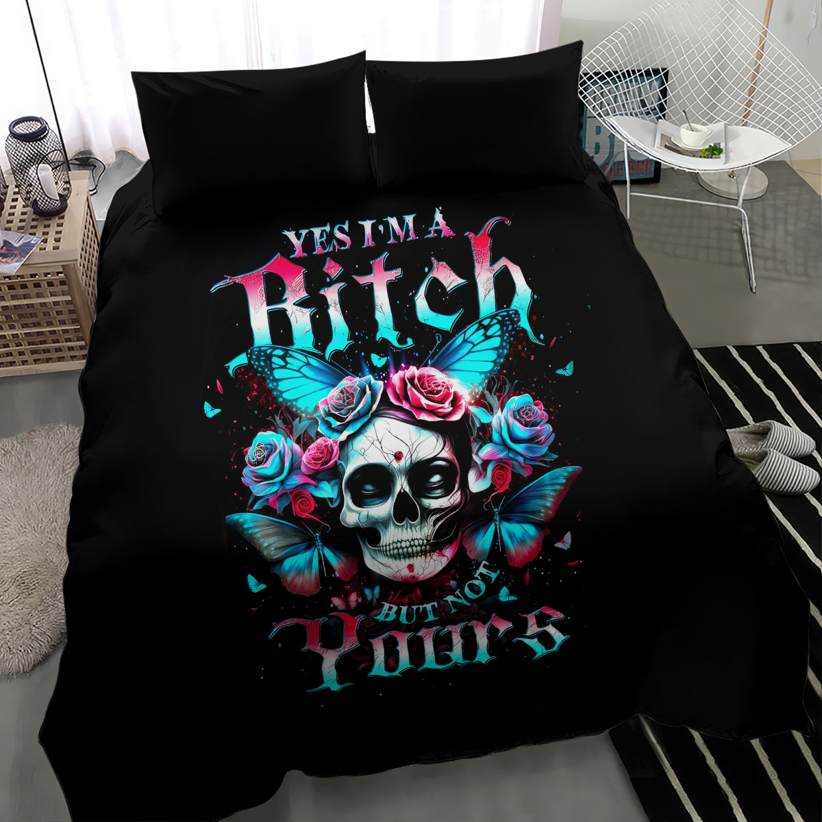 Black duvet cover and pillowcases with neon skull, roses, and butterfly wings graphic