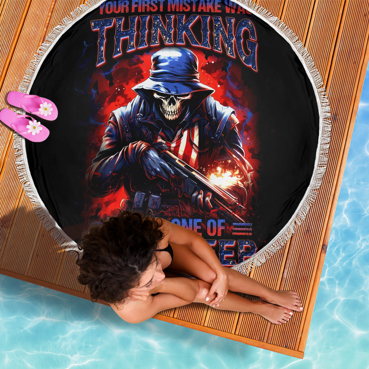 Black round beach blanket with fringe edge and skull soldier rifle graphic