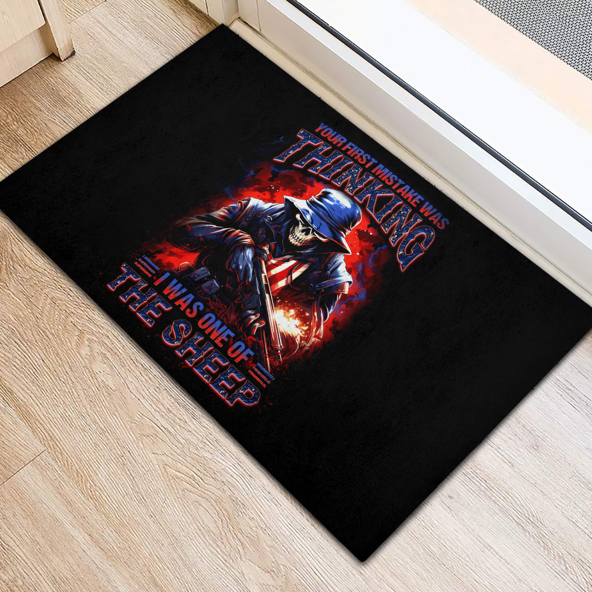 Black rubber doormat with soldier skull graphic and red-blue text