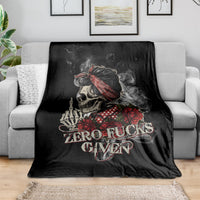 Black skull and rose throw blanket with 'ZERO FUCKS GIVEN' graphic on couch