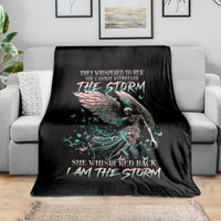 Black angel skull throw blanket with winged figure and text 'I AM THE STORM'