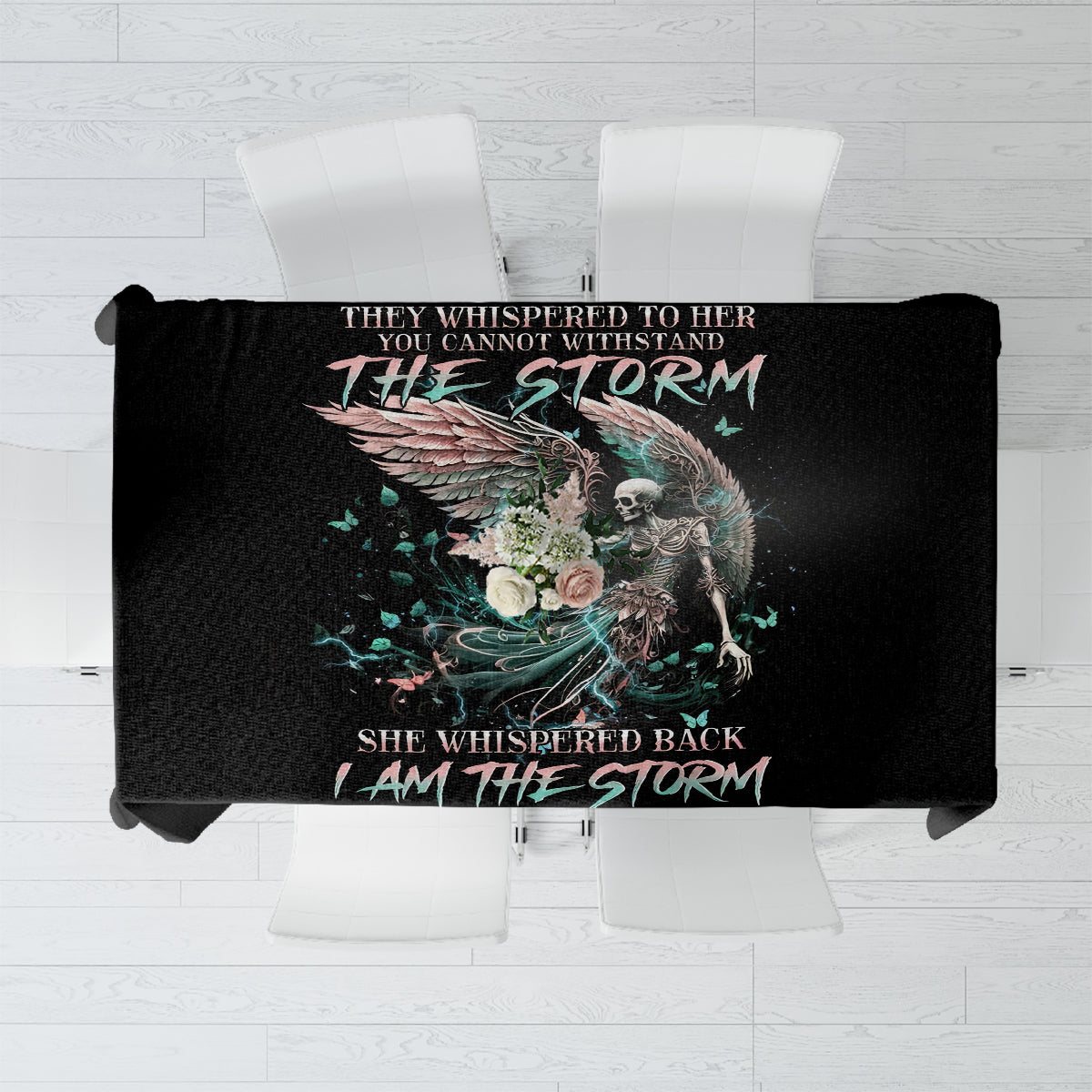 Black tablecloth with colorful skull-and-angel graphic and storm text panel