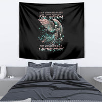 Black skull and angel graphic tapestry wall hanging with teal and pink feather details