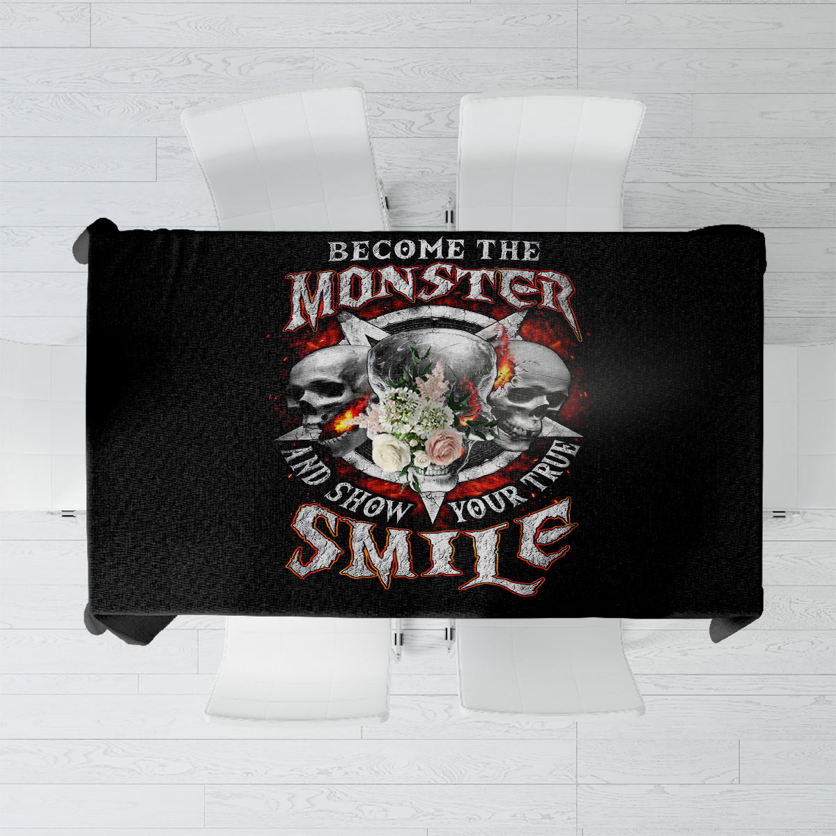 Black tablecloth featuring skull art and the text "Become the monster"