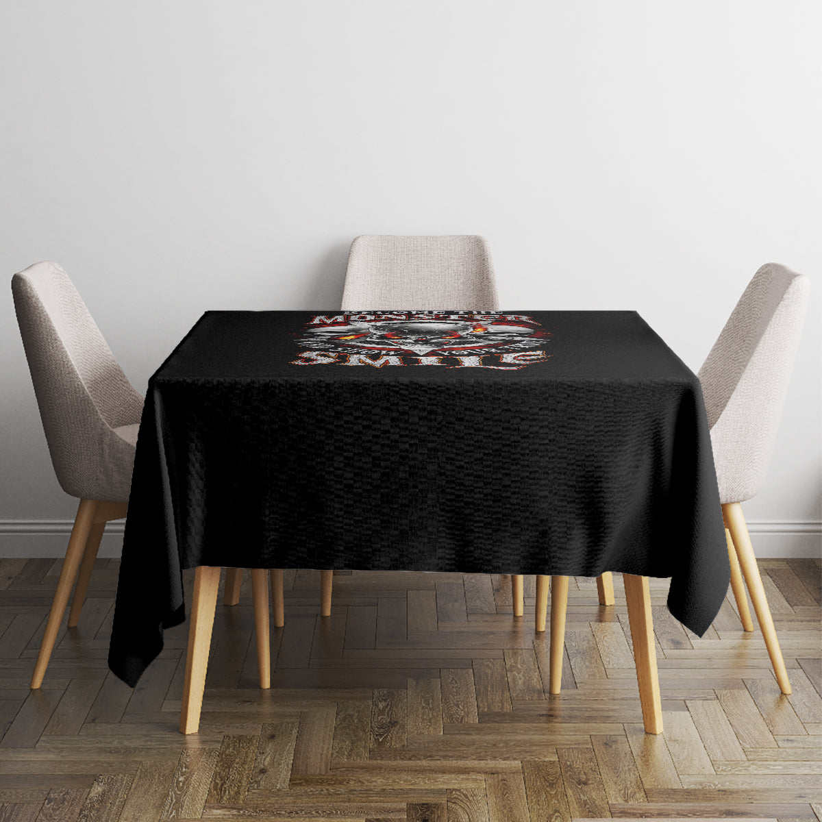 Black square tablecloth with a small skull graphic on the tabletop