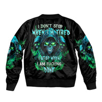 Black bomber jacket with neon skull graphic and flame text on the back, ribbed cuffs