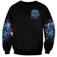 Black unisex sweatshirt with small colorful skull rose graphic on front