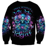 Black unisex sweatshirt with large colorful rose skull graphic on front