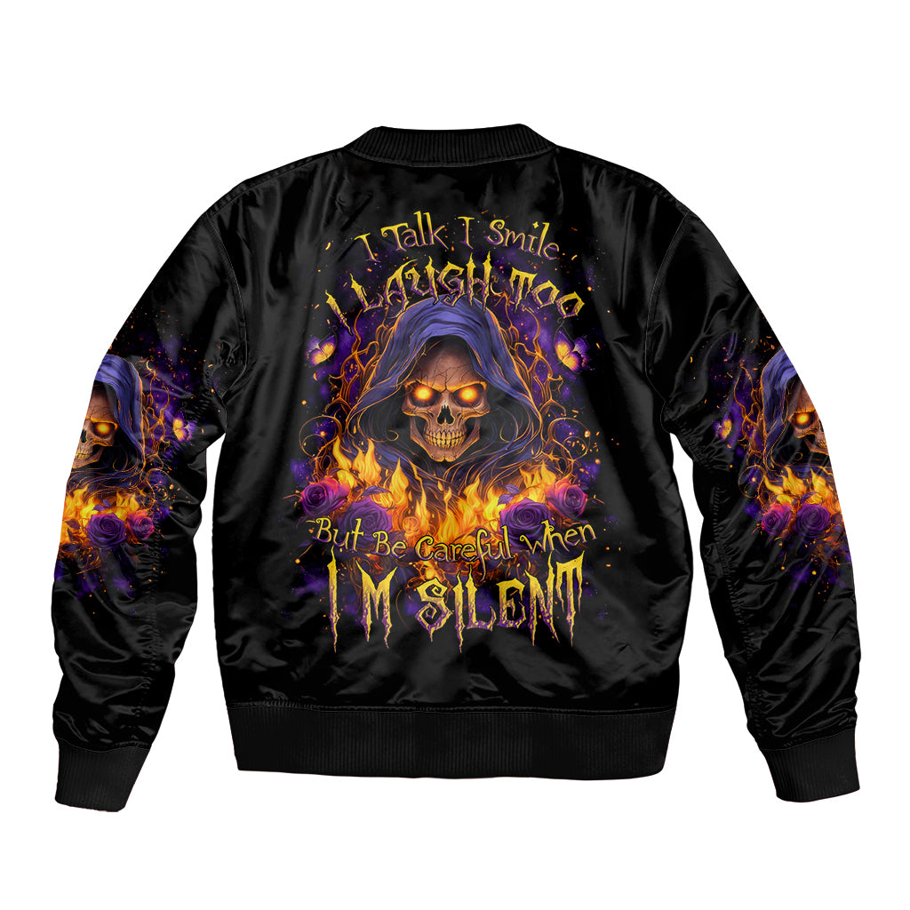 Black bomber jacket with flame skull graphic on back, ribbed collar and cuffs