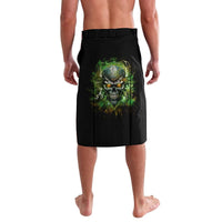 Black board shorts with green skull graphic on front