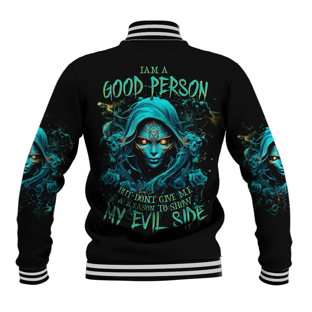 Black baseball jacket with striped ribbed collar, back teal skull graphic and text