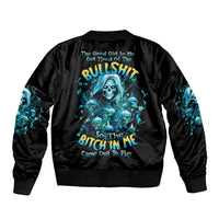 Black bomber jacket with large back graphic of skull girl; ribbed cuffs and hem