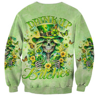 Green unisex sweatshirt with front skull, butterflies, and floral shamrock graphic