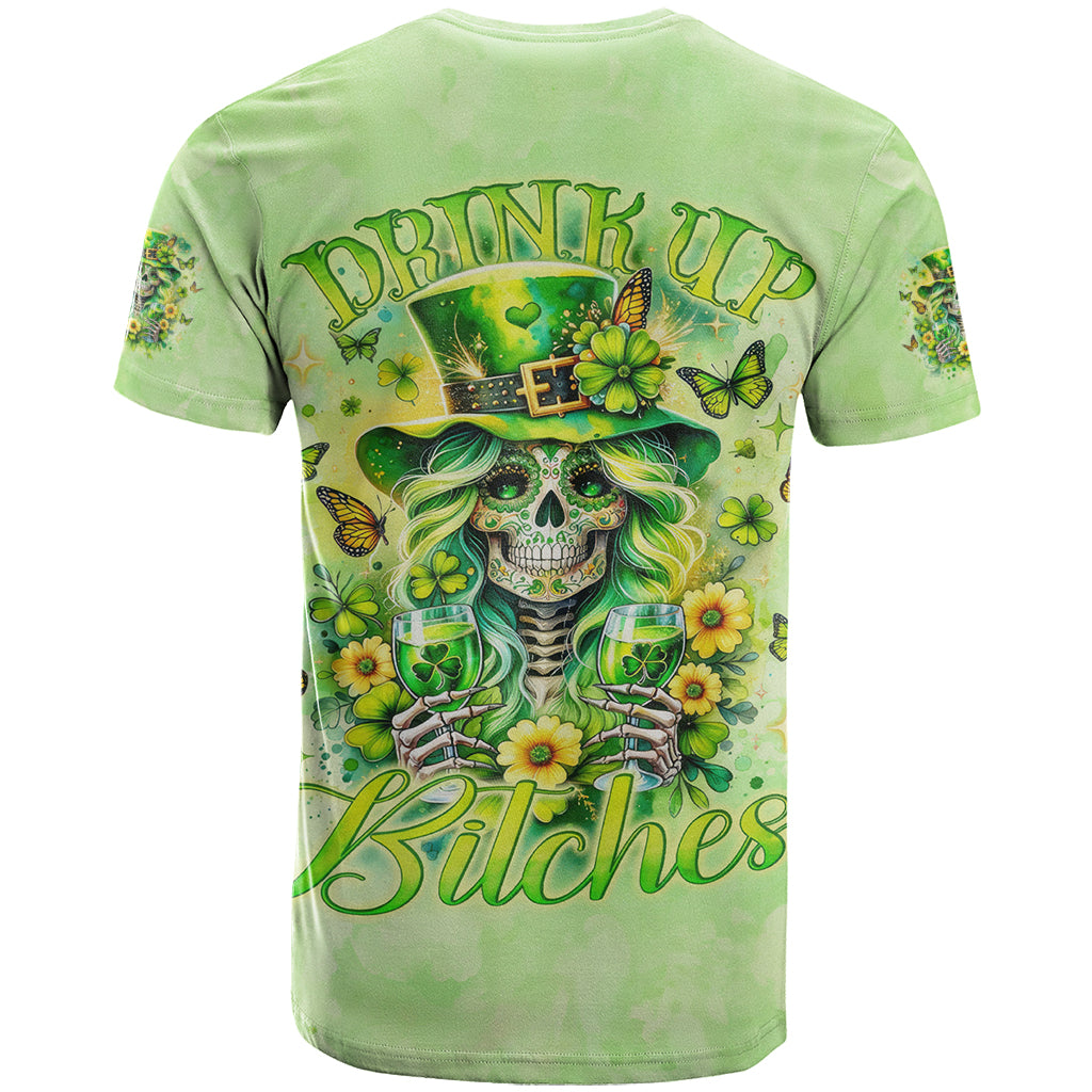 Green t-shirt with skull, clovers, and butterflies graphic on the back
