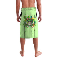 Green lava lava sarong skirt with skull and shamrock graphic, elastic waistband.