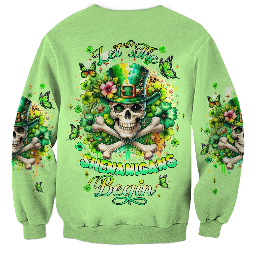 Green crewneck sweatshirt with skull shamrock graphic and long sleeves