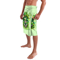 Green lavalava skirt with skull graphic; side drape and front overlap