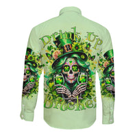 Green long-sleeve button-up shirt with back skull and shamrock graphic