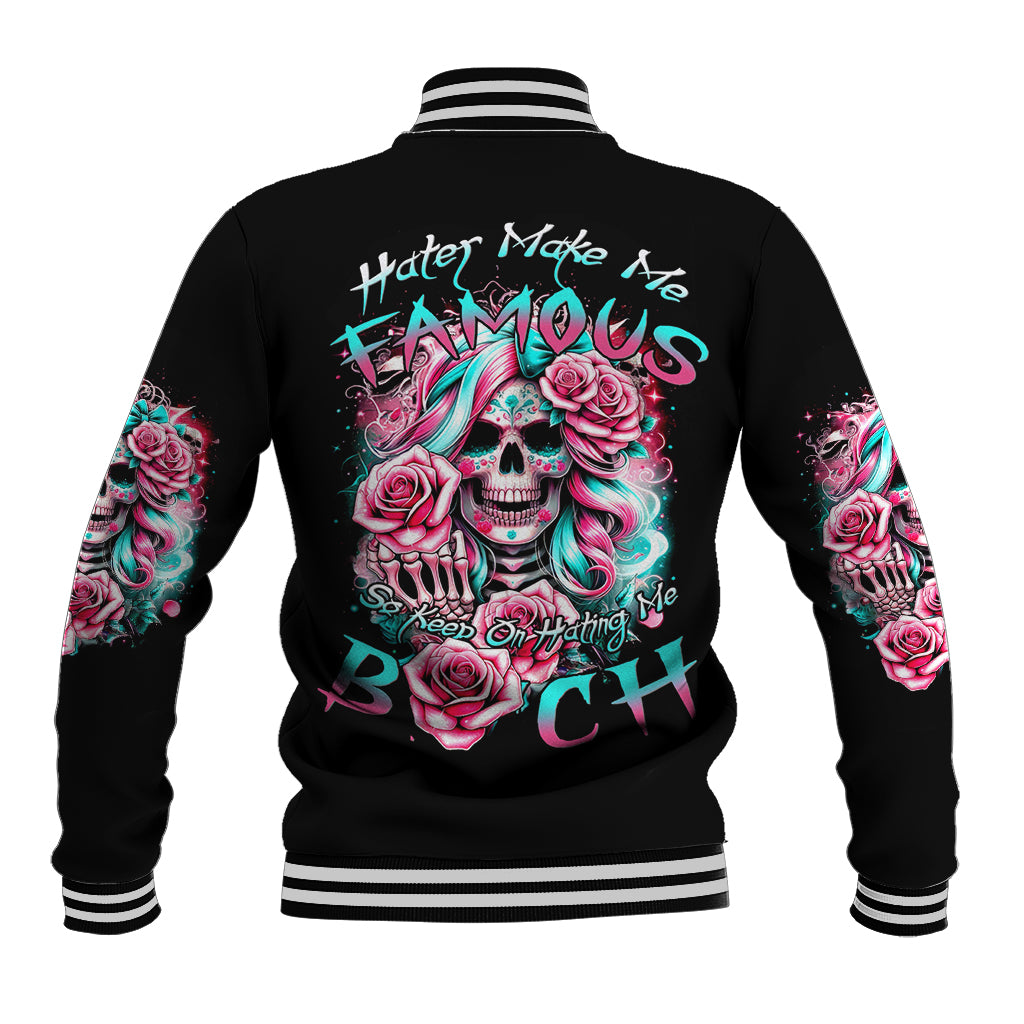 Black baseball jacket with skull-and-rose graphic on back, striped collar and cuffs