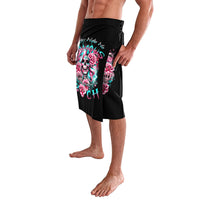 Black knee-length skirt with colorful skull and rose print, side drape