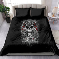 Black bedding set featuring a central skull design on duvet with two pillows