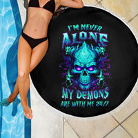 Black round beach blanket with fringe, blue neon skull and '24/7' text, poolside